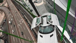 Mercedes Doesn't Trust Gullwing Doors To Fly SLS AMG Atop Museum